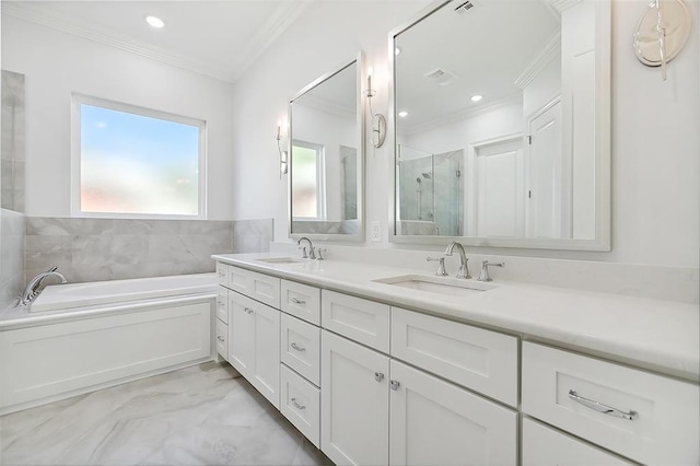 753 Jefferson Heights Ave, Jefferson, LA 70121 - full bathroom with ornamental molding, double vanity, a shower stall, a bath, and marble finish floors