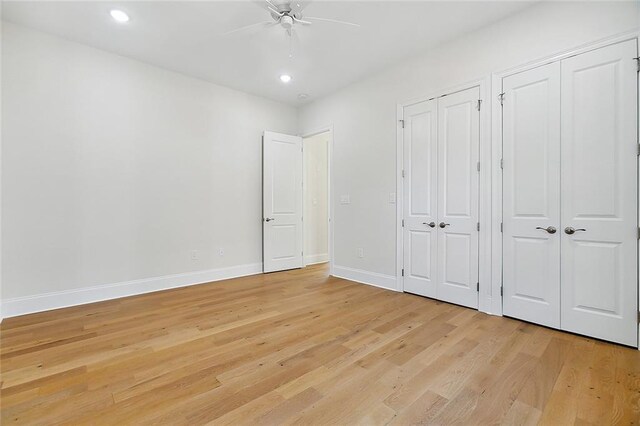 753 Jefferson Heights Ave, Jefferson, LA 70121 - unfurnished bedroom featuring multiple closets, light wood-style flooring, baseboards, recessed lighting, and a ceiling fan