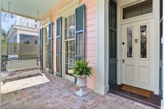 property entrance with a porch