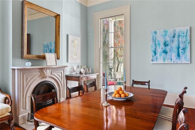 dining area featuring ornamental molding