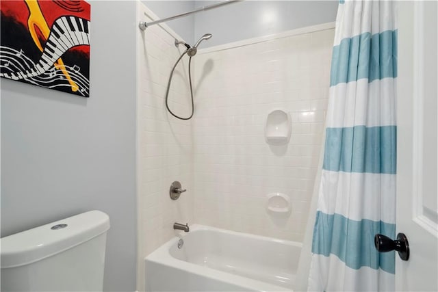 full bath featuring shower / bathtub combination with curtain and toilet