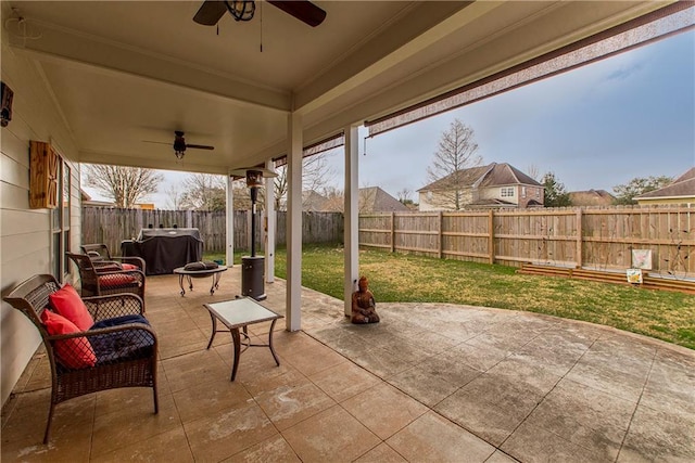 18201 Pine Ridge Dr, Prairieville, LA 70769 - view of patio featuring a fenced backyard, a grill, and a ceiling fan