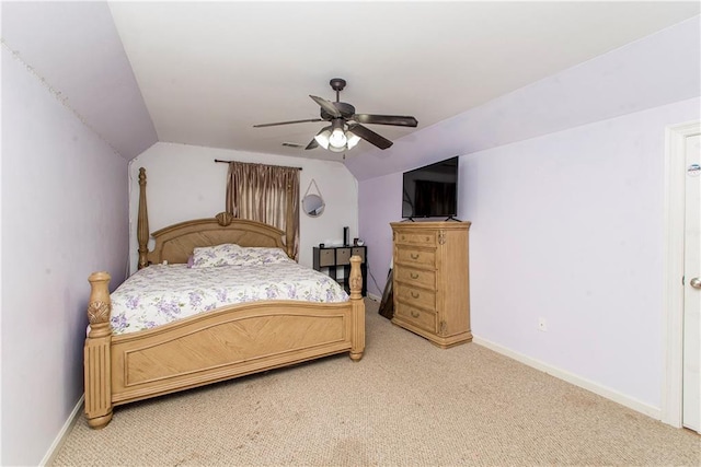 18201 Pine Ridge Dr, Prairieville, LA 70769 - bedroom featuring baseboards, lofted ceiling, ceiling fan, and light colored carpet