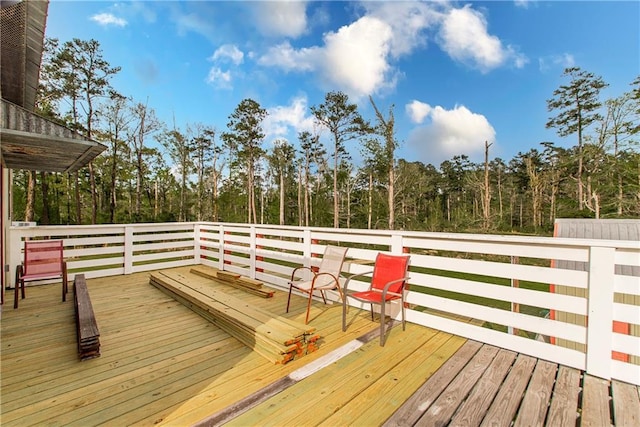 34310 Bluff Line Rd, Independence, LA 70443 - wooden deck with a forest view
