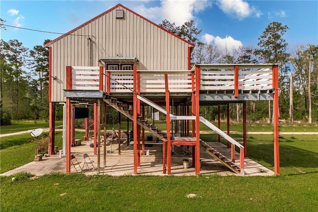 34310 Bluff Line Rd, Independence, LA 70443 - view of jungle gym with a patio area, stairway, a deck, and a lawn
