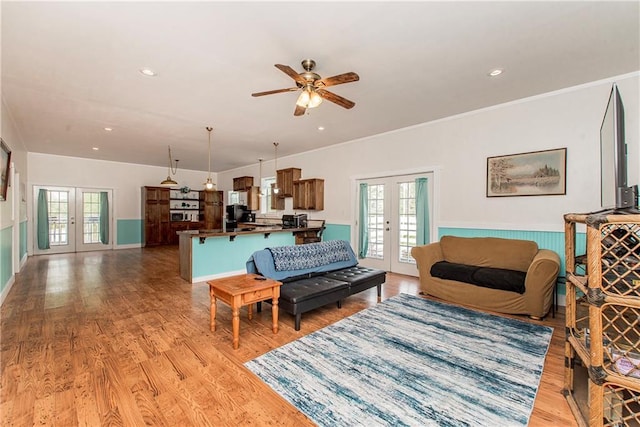 34310 Bluff Line Rd, Independence, LA 70443 - living room with light wood finished floors, recessed lighting, ceiling fan, and french doors