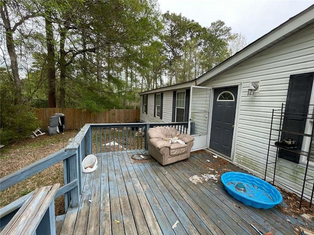 wooden deck featuring fence