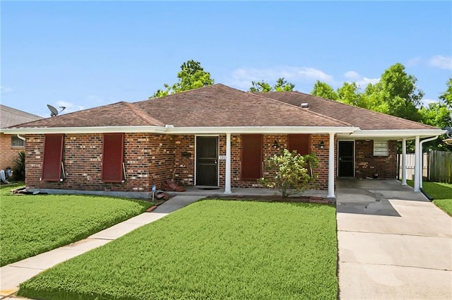 13118 Lemans St, New Orleans, LA 70129 - ranch-style home featuring concrete driveway, a porch, brick siding, a shingled roof, and a carport