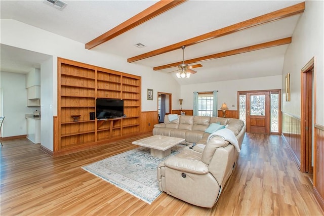 132 Country Club Dr, Covington, LA 70433 - living area with vaulted ceiling with beams, visible vents, and light wood finished floors