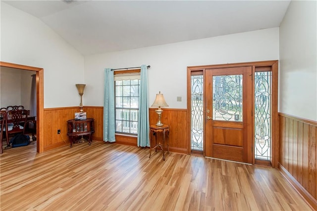 132 Country Club Dr, Covington, LA 70433 - foyer featuring a wainscoted wall, wood finished floors, and vaulted ceiling