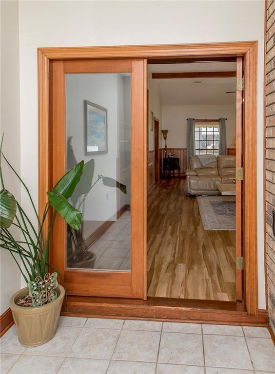 132 Country Club Dr, Covington, LA 70433 - interior space with tile patterned flooring