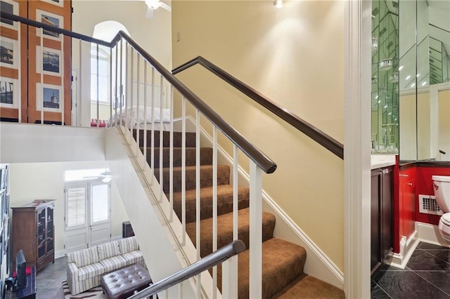 1040 Chartres St Unit D9, New Orleans, LA 70116 - stairs with ceiling fan and baseboards