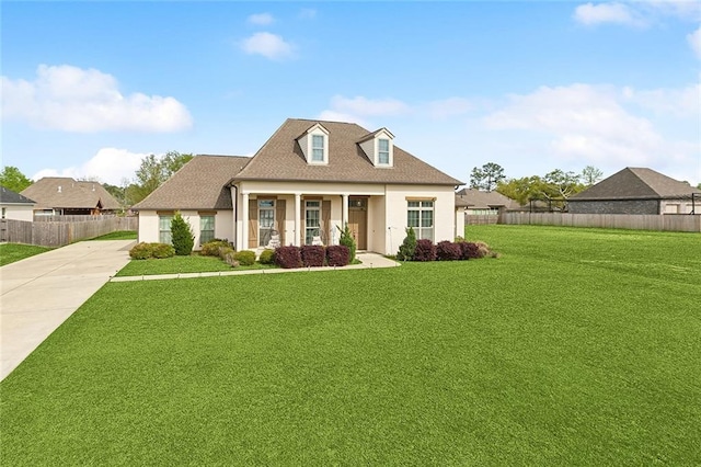 531 N Caleb Dr, Slidell, LA 70461 - cape cod-style house with stucco siding, driveway, and a shingled roof