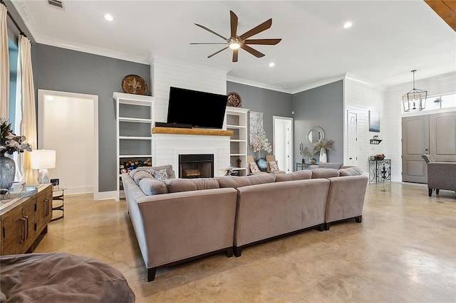 531 N Caleb Dr, Slidell, LA 70461 - living area featuring ceiling fan, crown molding, a fireplace, recessed lighting, and finished concrete flooring