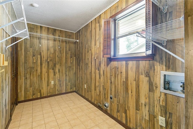 47116 N Morrison Blvd, Hammond, LA 70401 - interior space featuring crown molding, a textured ceiling, baseboards, and wooden walls