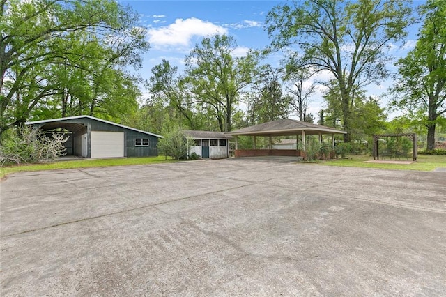 47116 N Morrison Blvd, Hammond, LA 70401 - view of front of property with a detached garage, an outbuilding, a gazebo, and driveway