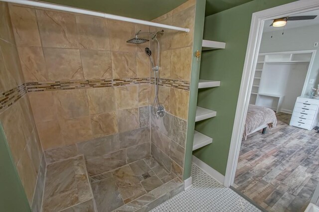 full bath featuring tiled shower