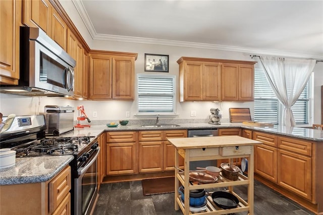 4718 Annette St, New Orleans, LA 70122 - kitchen with a peninsula, ornamental molding, appliances with stainless steel finishes, a sink, and open shelves