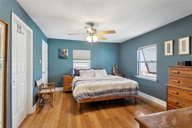 4718 Annette St, New Orleans, LA 70122 - bedroom featuring baseboards, ceiling fan, and light wood-type flooring