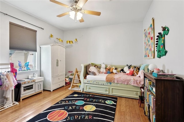 4718 Annette St, New Orleans, LA 70122 - bedroom featuring a ceiling fan and light wood-style floors