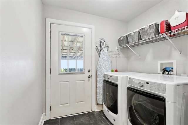 4718 Annette St, New Orleans, LA 70122 - laundry area featuring washer and clothes dryer, baseboards, and laundry area