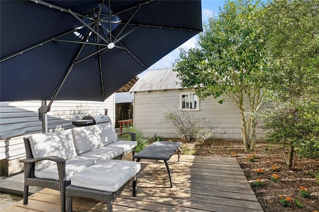 4718 Annette St, New Orleans, LA 70122 - wooden deck featuring outdoor lounge area