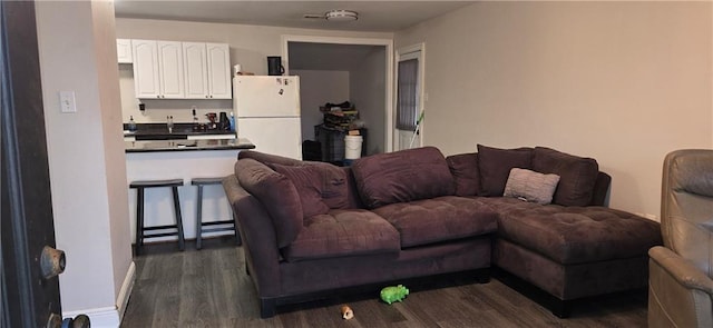 2713 Volpe Dr, Chalmette, LA 70043 - living room featuring dark wood finished floors