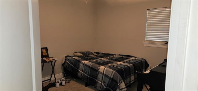 2713 Volpe Dr, Chalmette, LA 70043 - carpeted bedroom featuring baseboards