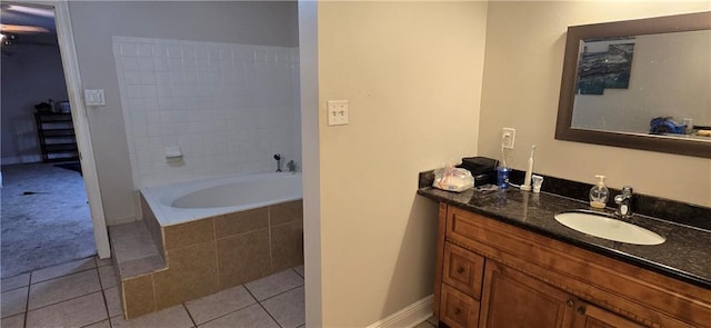 2713 Volpe Dr, Chalmette, LA 70043 - full bathroom featuring a relaxing tiled tub, tile patterned floors, and vanity