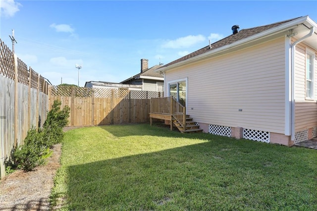view of yard featuring a fenced backyard