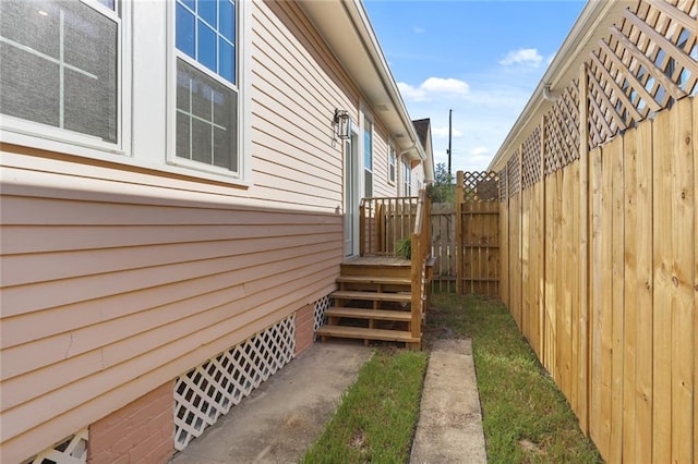 view of side of property with fence