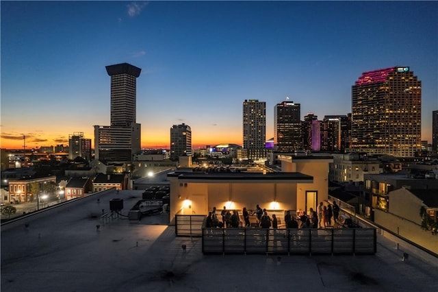 731 St Charles Ave Unit 402, New Orleans, LA 70130 - patio terrace at dusk featuring a view of skyline