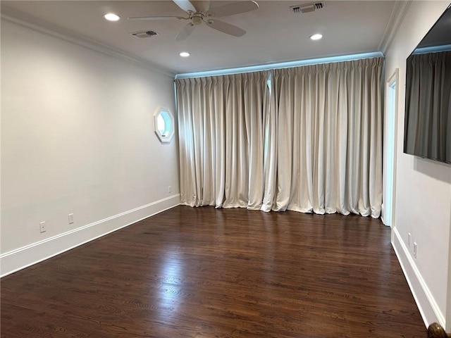 unfurnished room featuring visible vents, ceiling fan, and ornamental molding