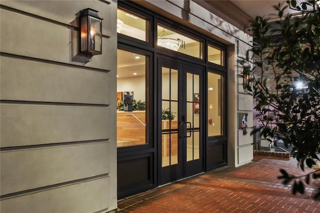 property entrance featuring french doors