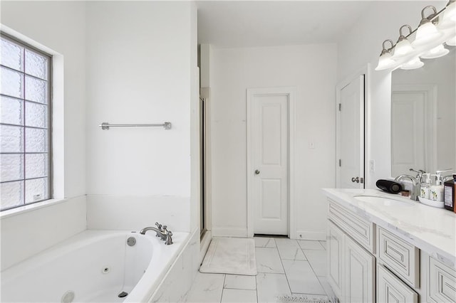 227 Riverlands Dr, La Place, LA 70068 - bathroom featuring vanity, a tub with jets, marble finish flooring, and a shower with shower door