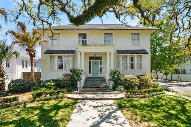 119 Audubon Blvd, New Orleans, LA 70118 - view of front of home featuring stucco siding