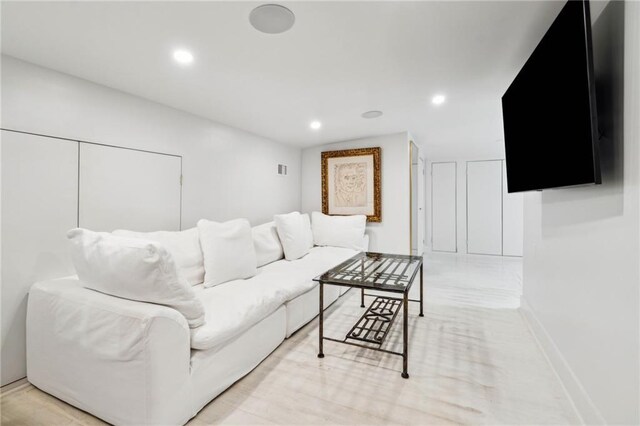 119 Audubon Blvd, New Orleans, LA 70118 - living area featuring recessed lighting and baseboards