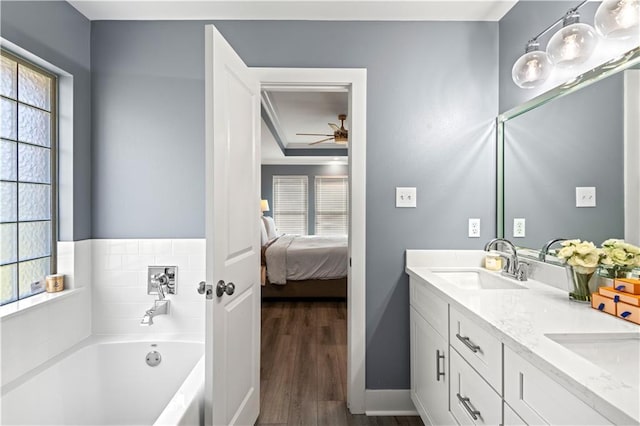 313 Oak Point Dr, La Place, LA 70068 - full bathroom featuring plenty of natural light, ensuite bathroom, a ceiling fan, and a bath