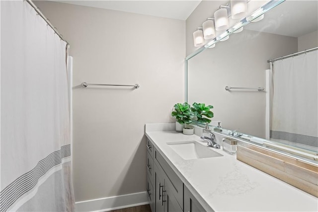 313 Oak Point Dr, La Place, LA 70068 - bathroom with vanity and baseboards