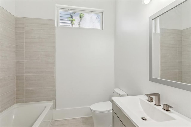 2460 N Villere St, New Orleans, LA 70117 - bathroom featuring toilet, vanity, and bathtub / shower combination