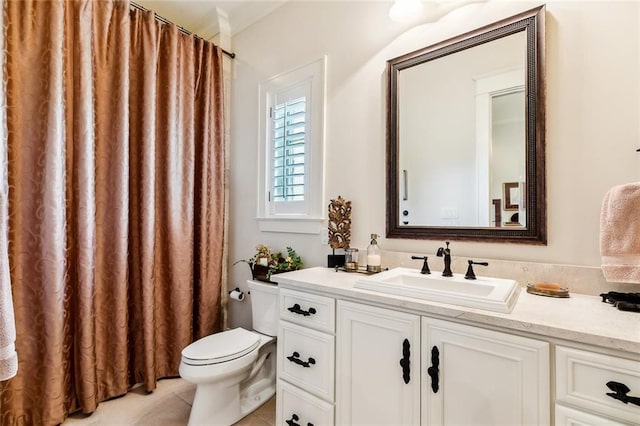 full bathroom with curtained shower, toilet, tile patterned flooring, and vanity