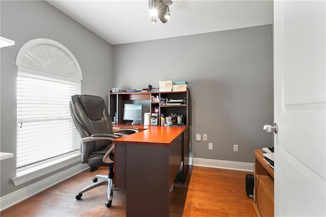 3416 Dauterive Dr, Chalmette, LA 70043 - home office featuring baseboards and wood finished floors