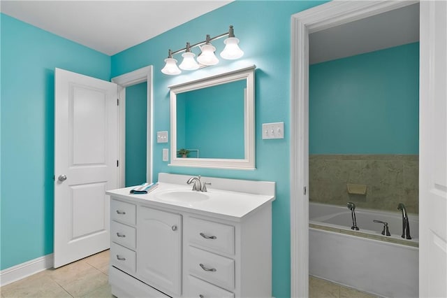 3416 Dauterive Dr, Chalmette, LA 70043 - bathroom with tile patterned floors, a garden tub, and vanity