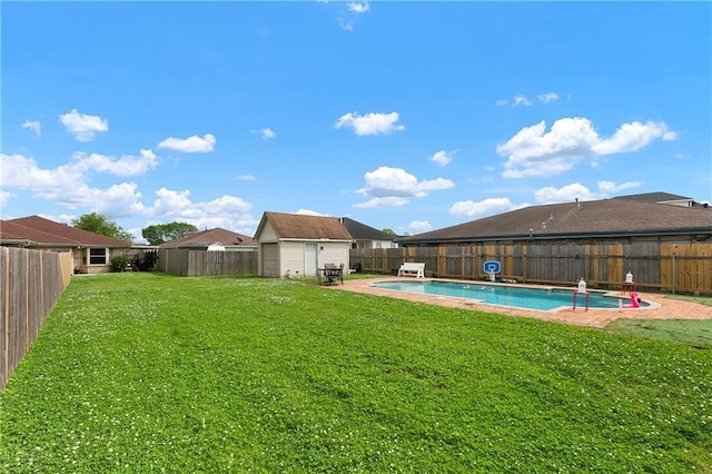 3416 Dauterive Dr, Chalmette, LA 70043 - view of yard with an outbuilding, a fenced backyard, and a fenced in pool