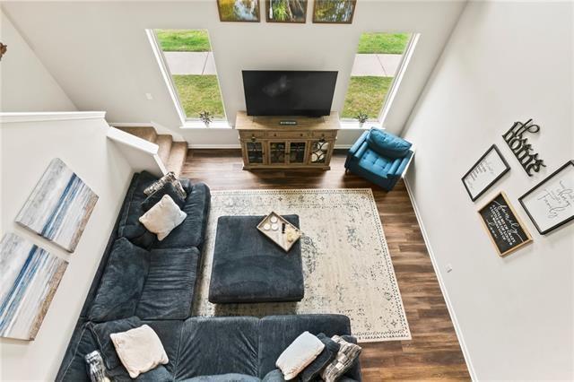 405 Short Bough Ln, Slidell, LA 70461 - living area with wood finished floors and baseboards
