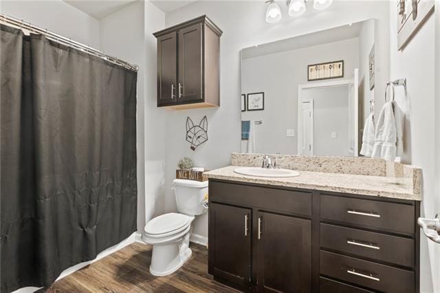 405 Short Bough Ln, Slidell, LA 70461 - bathroom with vanity, wood finished floors, and a shower with curtain