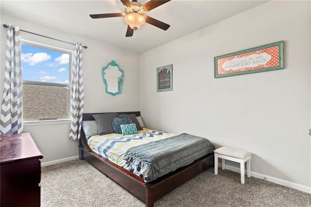 405 Short Bough Ln, Slidell, LA 70461 - bedroom with carpet and ceiling fan
