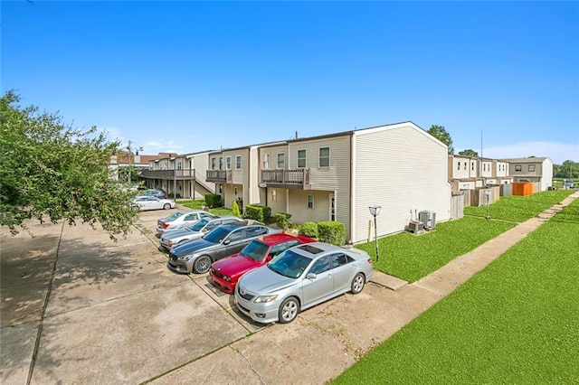 1020 Saint Julien Dr Unit 226, Kenner, LA 70065 - view of building exterior with a residential view and uncovered parking