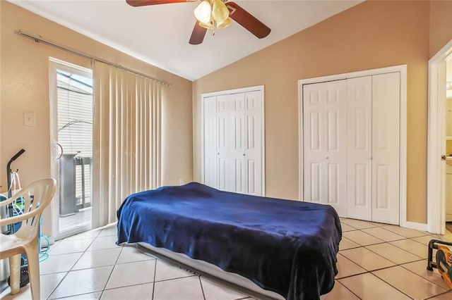 1020 Saint Julien Dr Unit 226, Kenner, LA 70065 - bedroom with lofted ceiling, light tile patterned floors, multiple closets, access to exterior, and ceiling fan