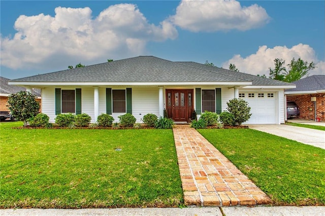 706 Natalie Dr, Houma, LA 70364 - ranch-style home with driveway, a front yard, a garage, and roof with shingles